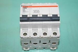 DISJONCTEUR 4P MERLIN GERIN 16A